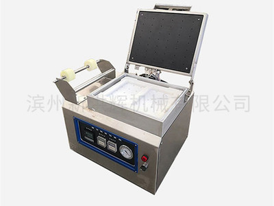 微型(xíng)貼體包裝機